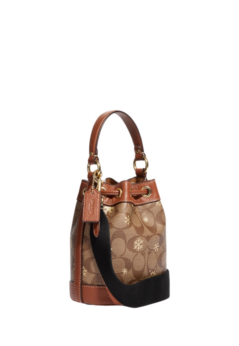 Dempsey Drawstring Bucket Bag 15 In Signature Canvas With Snowflake Print