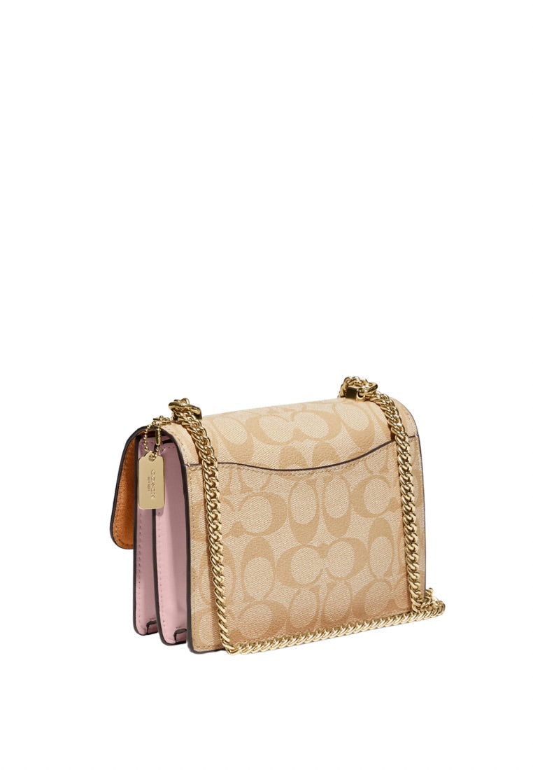 Mini Klare Crossbody In Signature Canvas Powder Pink