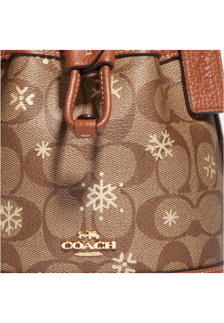 Dempsey Drawstring Bucket Bag 15 In Signature Canvas With Snowflake Print