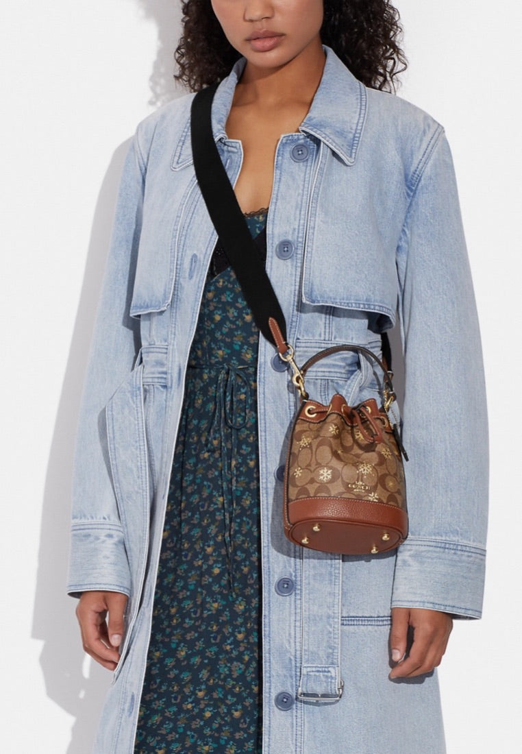 Dempsey Drawstring Bucket Bag 15 In Signature Canvas With Snowflake Print