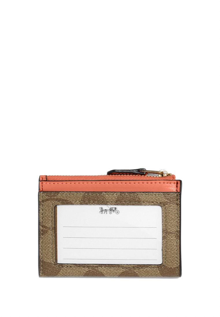 Mini Skinny Id Case In Signature Canvas Light Coral