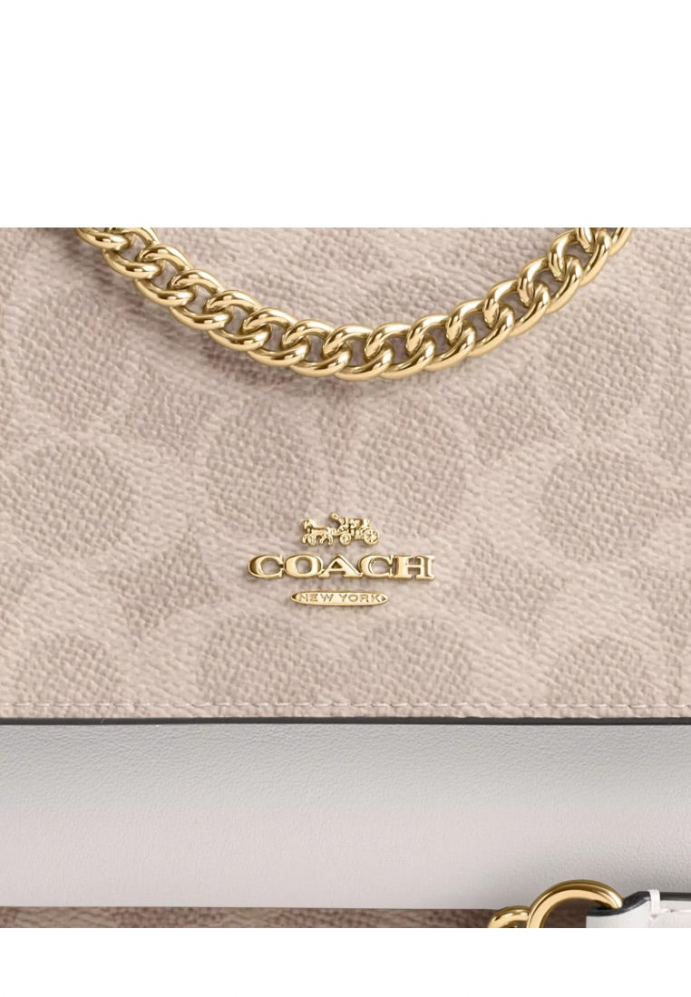 Mini Klare Crossbody Bag in Signature Canvas Gold Sand Chalk