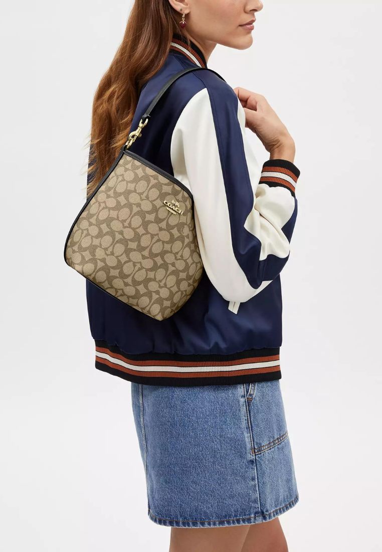 City Bucket Bag In Signature Canvas Tan Black