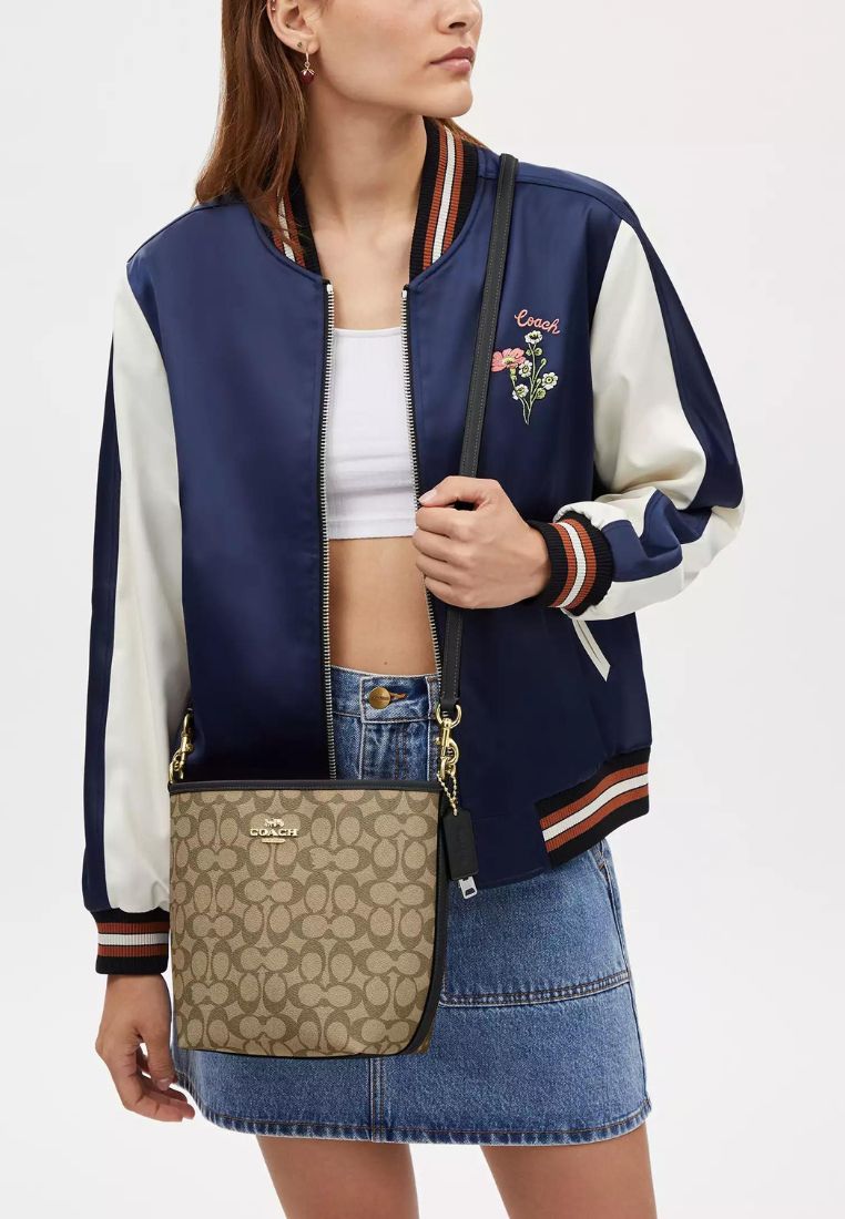 City Bucket Bag In Signature Canvas Tan Black