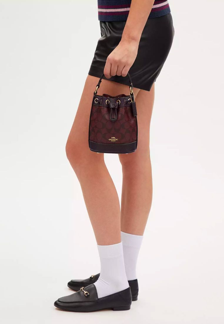 Dempsey Drawstring Bucket Bag 15 In Signature Canvas Oxblood Multi