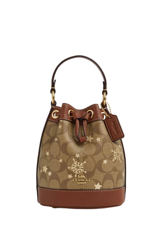 Dempsey Drawstring Bucket Bag 15 In Signature Canvas With Star And Snowflake Print