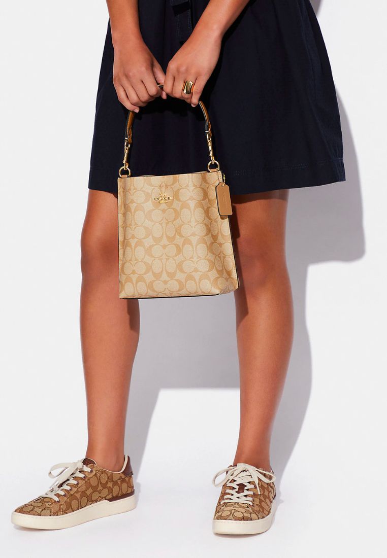 Mollie Bucket Bag 22 In Signature Canvas LT Saddle