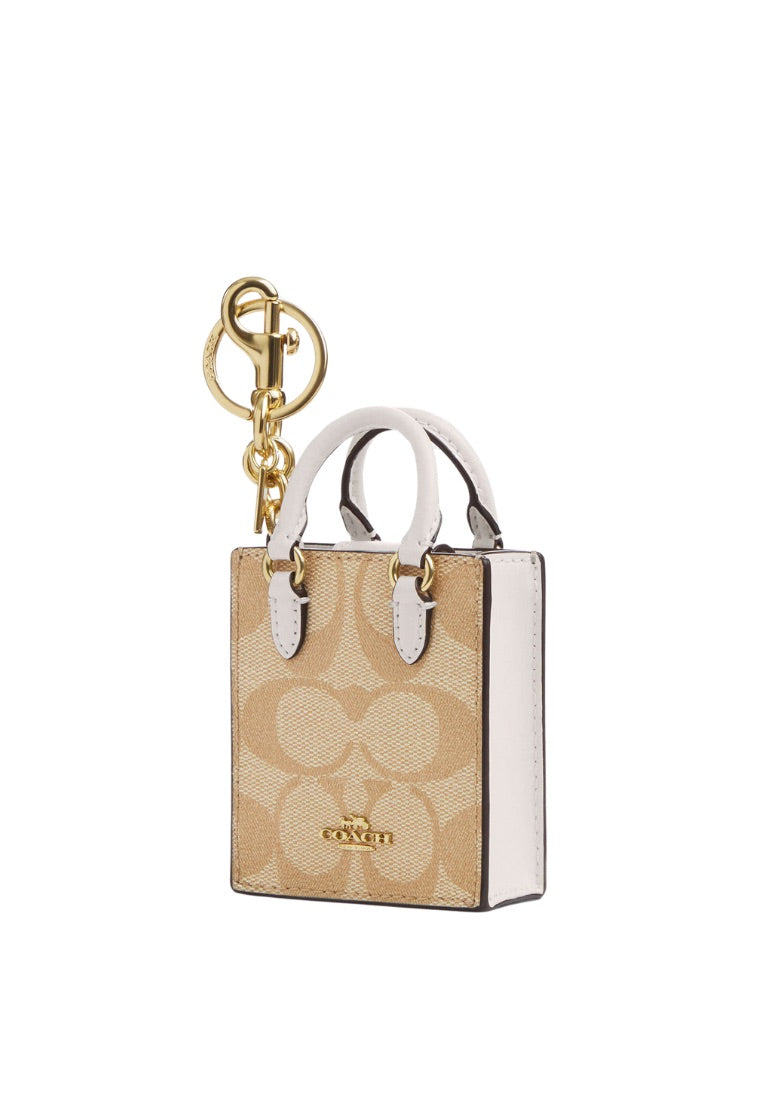 North/South Mini Tote Bag Charm In Signature Canvas Light Khaki Chalk