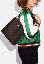 Mollie Bucket Bag In Signature Canvas Brown 1941 Red