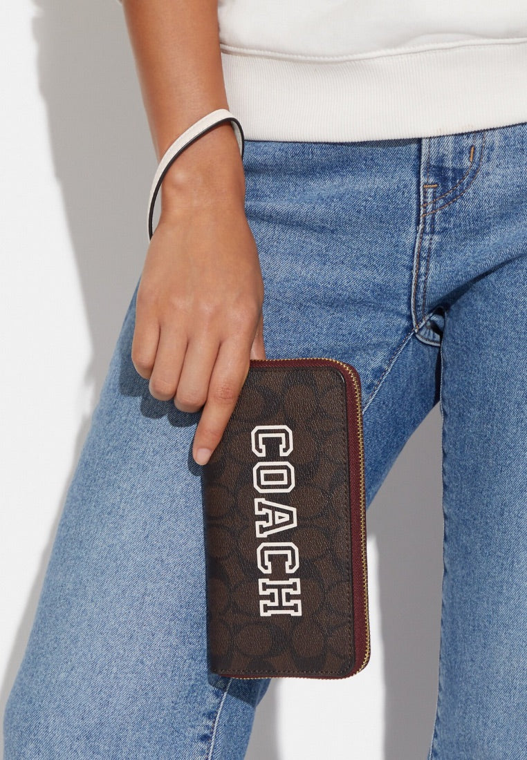 Long Zip Around Wallet In Signature Canvas With Varsity Motif Chalk Multi