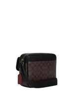 Hudson Crossbody Bag In Signature Canvas Mahogany Black