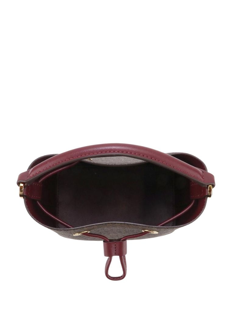 Suri Small Bucket Crossbody Bag In Signature Merlot