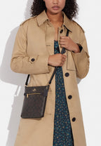 Mini Rowan File Bag In Signature Canvas Brown Black