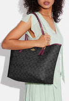 City Tote In Signature Canvas Black Cherry