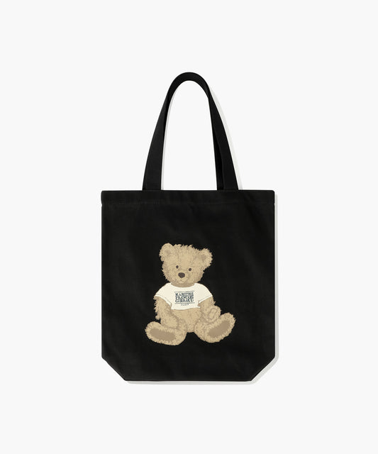 Marithe Francois Girbaud black coloured canvas tote bag with a teddy bear design in doodle style on a white background