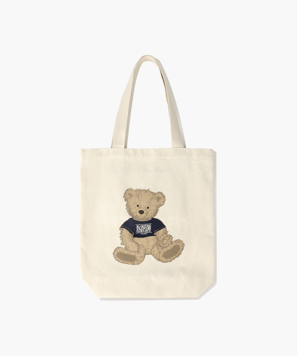 Marithe Francois Girbaud natural coloured canvas tote bag with a teddy bear design in doodle style on a white background
