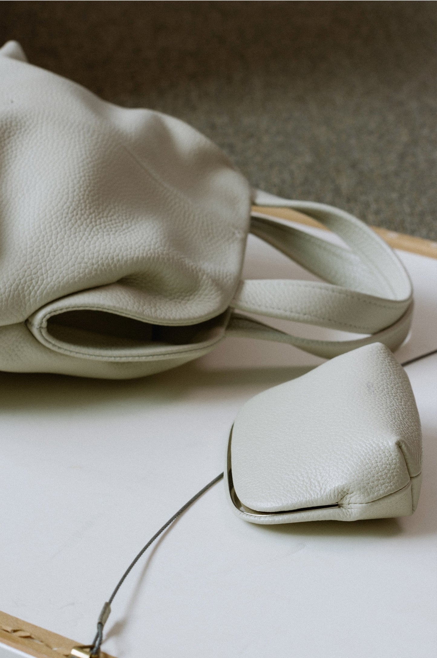 PAVE FRAME POUCH misty white