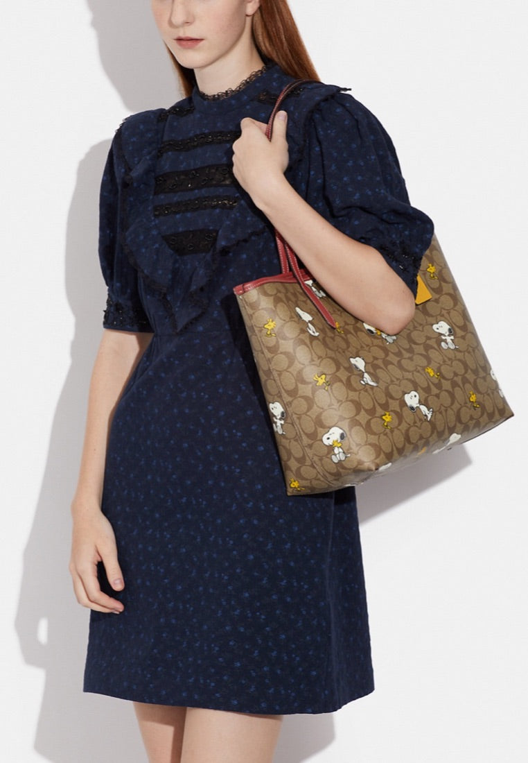Coach X Peanuts City Tote In Signature Canvas With Snoopy Woodstock Print Redwood Multi