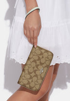 Long Zip Around Wallet In Signature Canvas Light Sage