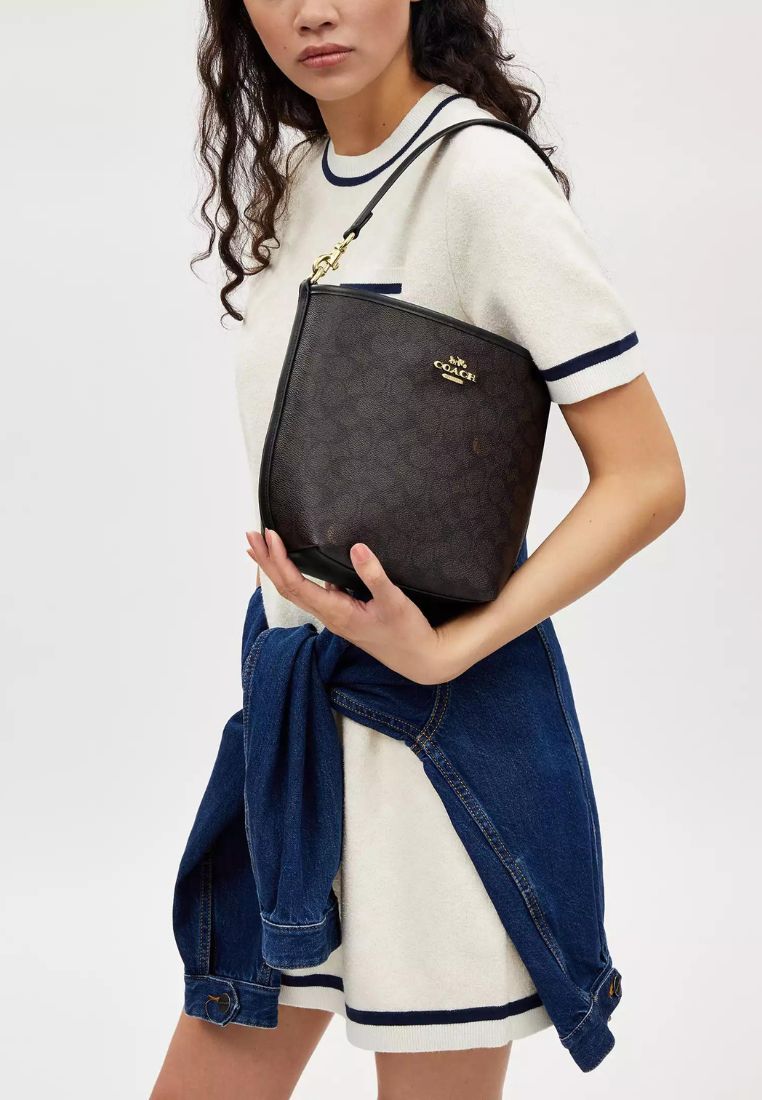 City Bucket Bag In Signature Canvas Walnut Black