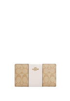 Slim Zip Wallet In Signature Canvas With Stripe Chalk Lt Saddle