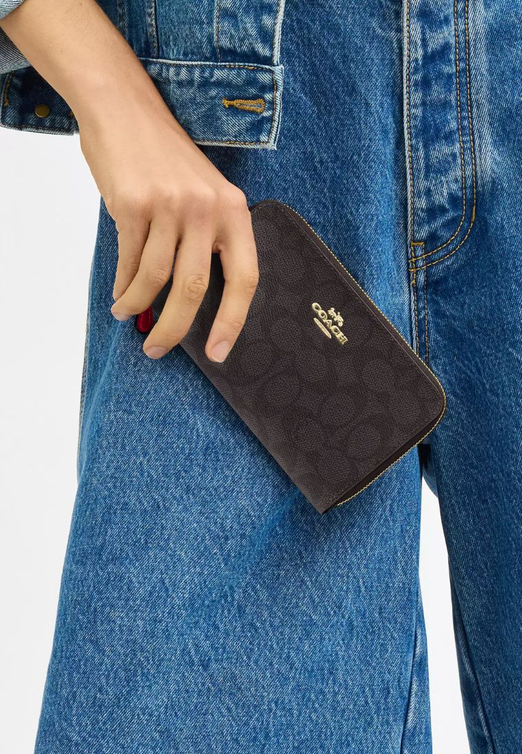 Medium Id Zip Wallet In Signature Canvas Walnut Bold Red
