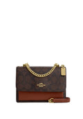 Mini Klare Crossbody In Signature Canvas Brown Redwood